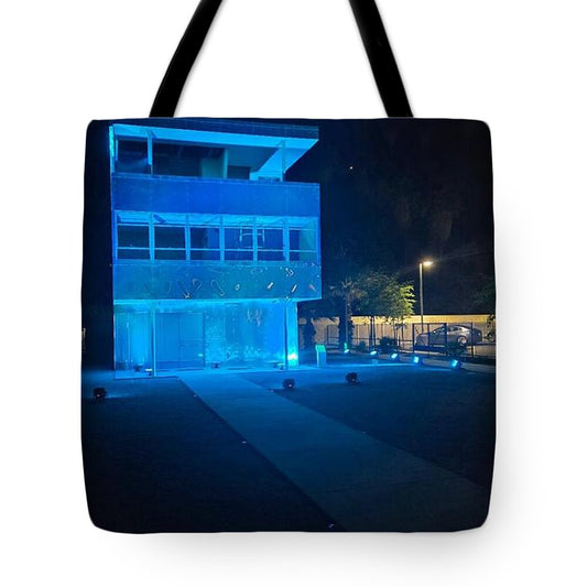 Blue Lit Modern Building at Night by JR Mitchell — Tote Bag