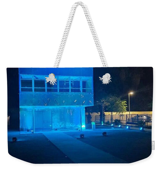Blue Lit Modern Building at Night by JR Mitchell — Weekender Tote Bag